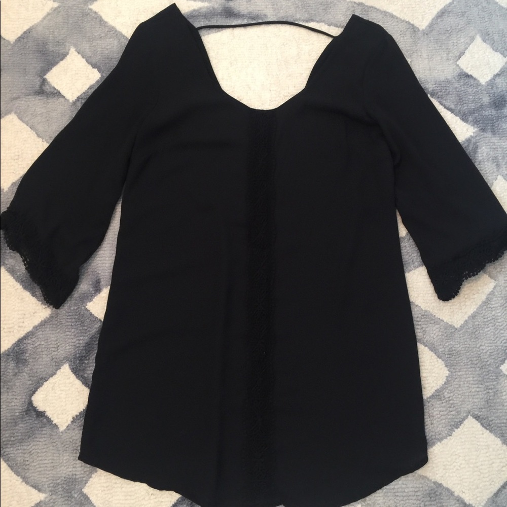 Black open back blouse